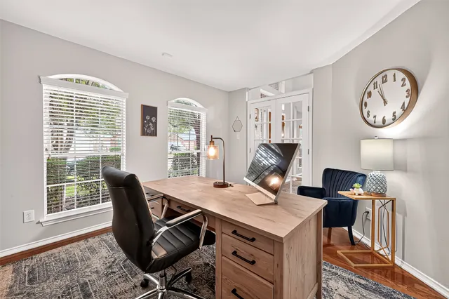 a view of a dining room with furniture window and wooden floor