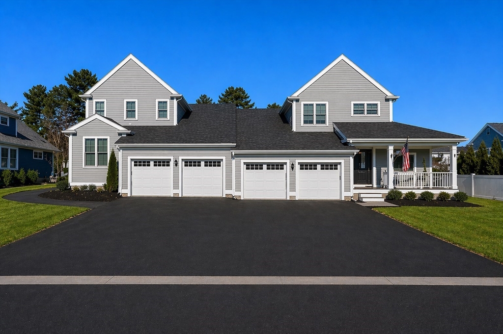 44 Mariners Way, Unit 44 Plymouth, MA 02360 - Photo 3 of 36 a front view of a house with a yard