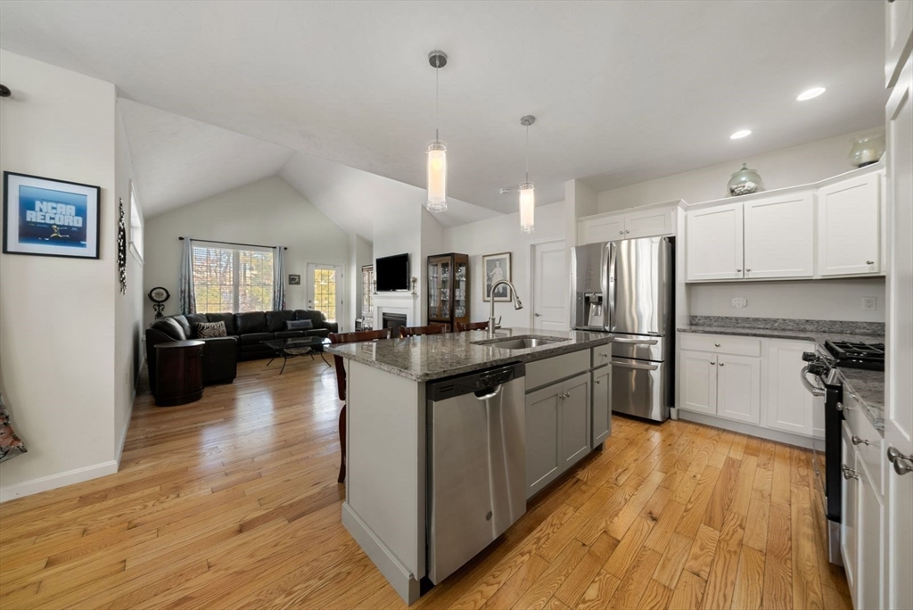 44 Mariners Way, Unit 44 Plymouth, MA 02360 - Photo 5 of 36 a large kitchen with stainless steel appliances lots of counter top space