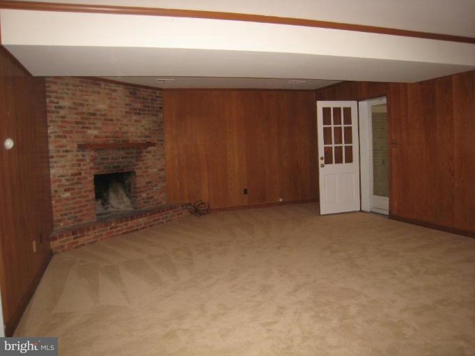 239 Providence Road Annapolis, MD 21409 - Photo 12 of 24 New carpet & brick fireplace in the family room!