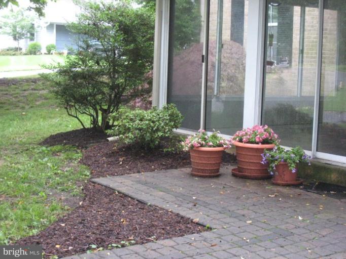 239 Providence Road Annapolis, MD 21409 - Photo 17 of 24 Paver patio from the enclosed porch!