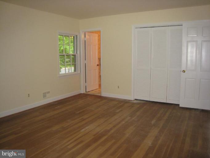 239 Providence Road Annapolis, MD 21409 - Photo 7 of 24 Harwood floors & solid wood 6 panel doors.