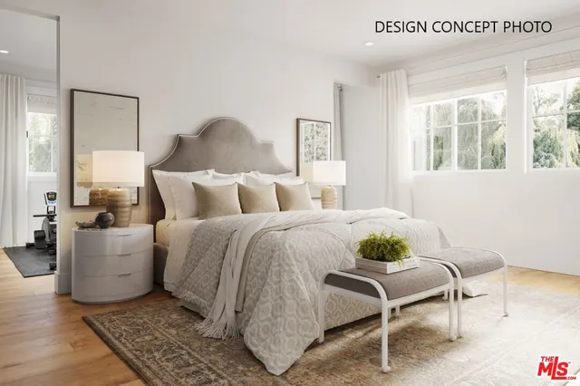 a bed room with furniture and a window