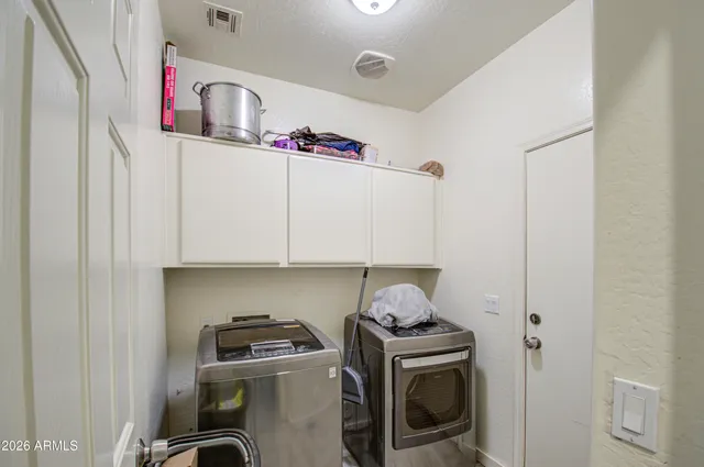 a kitchen with a stove and a microwave