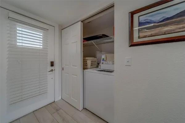 a view of a balcony with an ocean