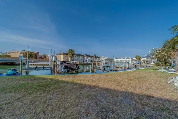 a view of a balcony with furniture