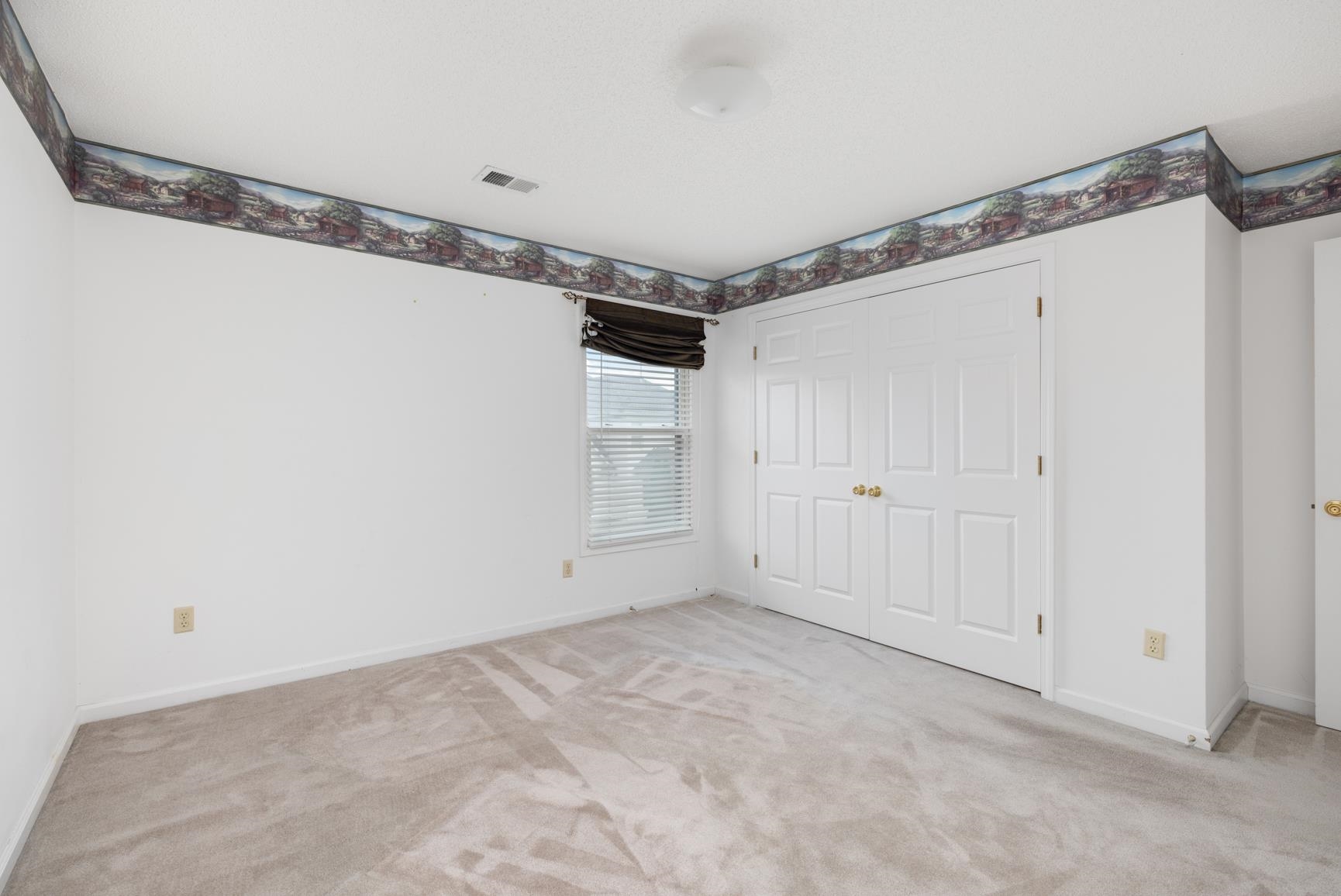 9015 Raspberry Lane Cordova, TN 38016 - Photo 31 of 40 Unfurnished bedroom featuring light colored carpet and a closet