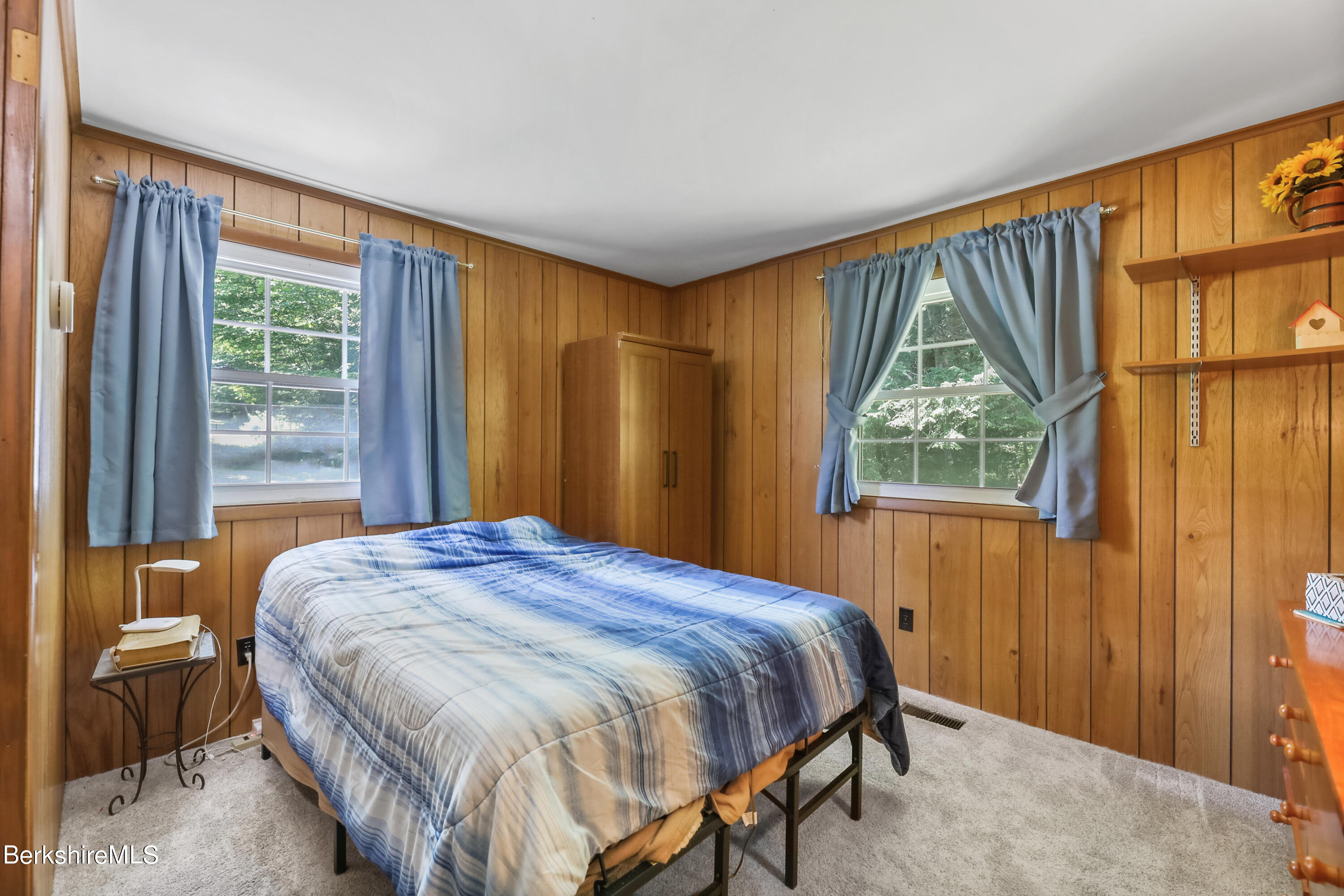 2375 North Main Road Otis, MA 01253 - Photo 12 of 31 a bedroom with a bed and a window