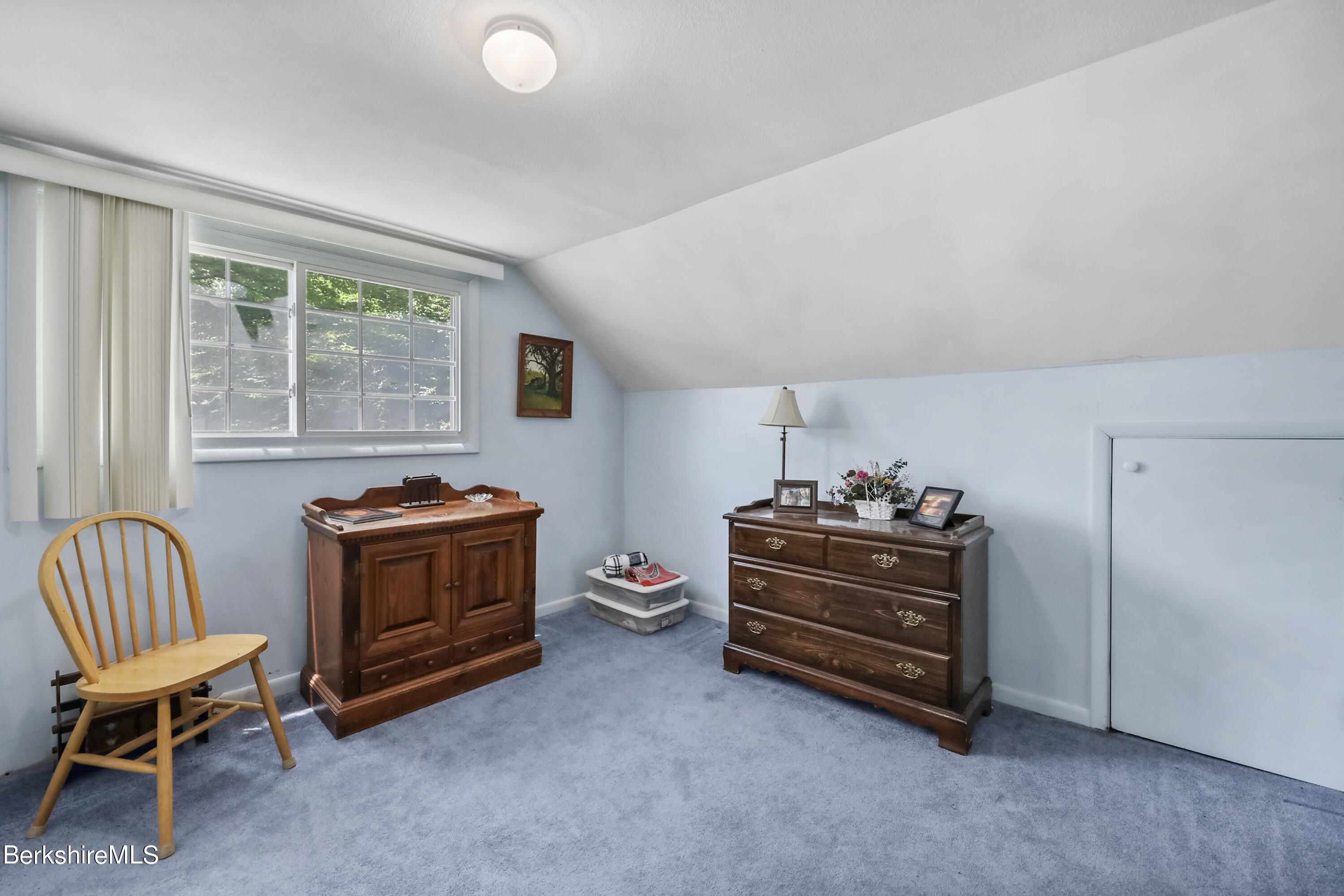 2375 North Main Road Otis, MA 01253 - Photo 25 of 31 a living room with furniture and a window