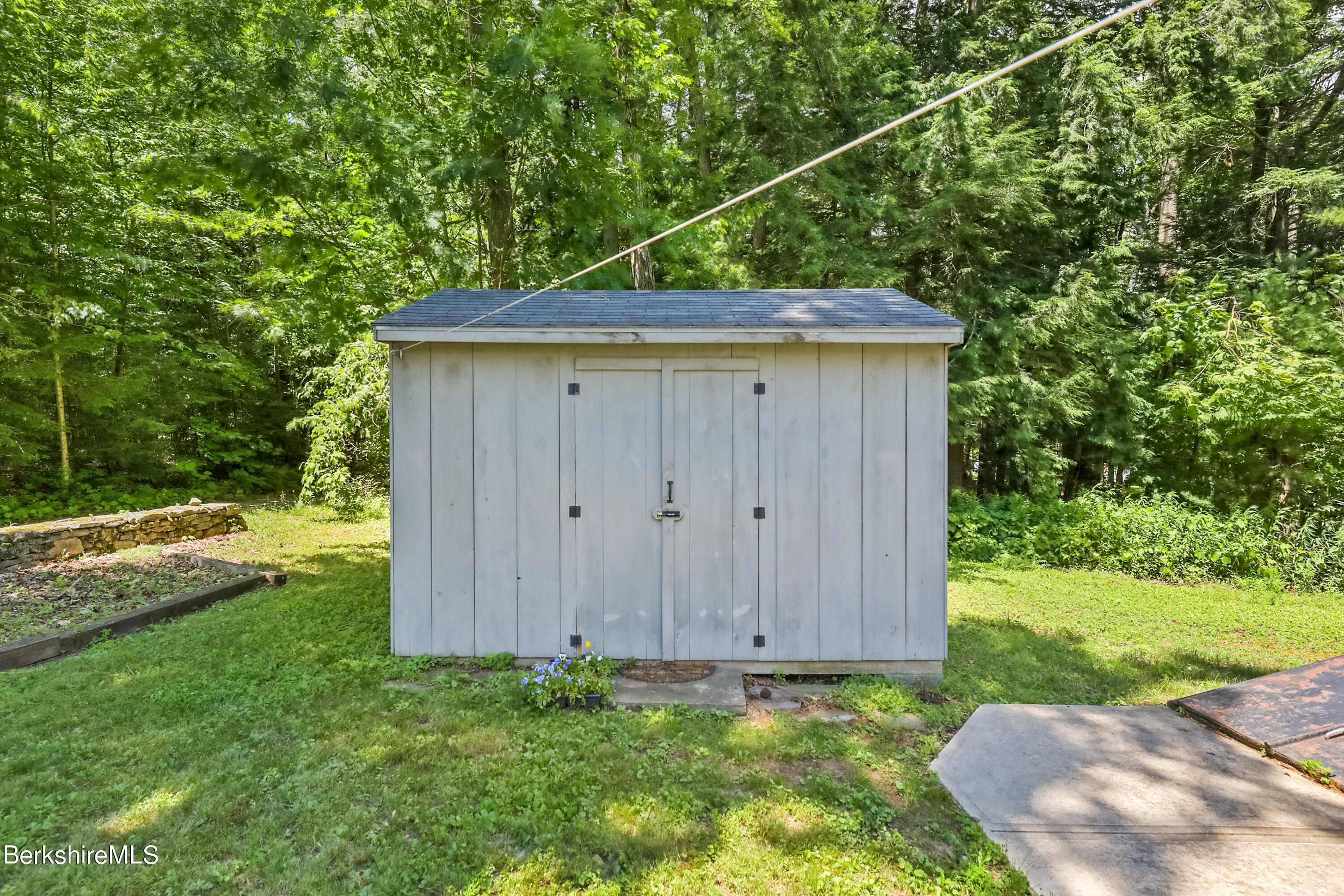 2375 North Main Road Otis, MA 01253 - Photo 29 of 31 a view of a backyard