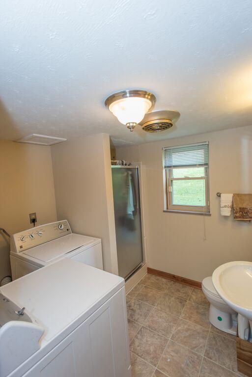 4605 Crestfield Road Knoxville, TN 37921 - Photo 24 of 28 LAUNDRY ROOM, BATH WITH WALK IN SHOWER
