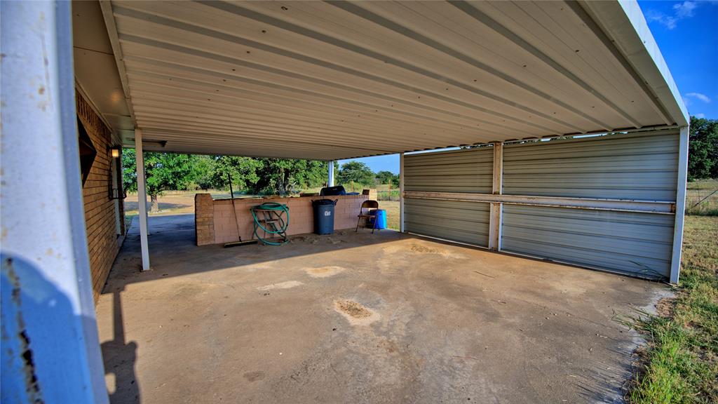 1740 Oakshores Road Nocona, TX 76255 - Photo 26 of 38 a view of a backyard of the house