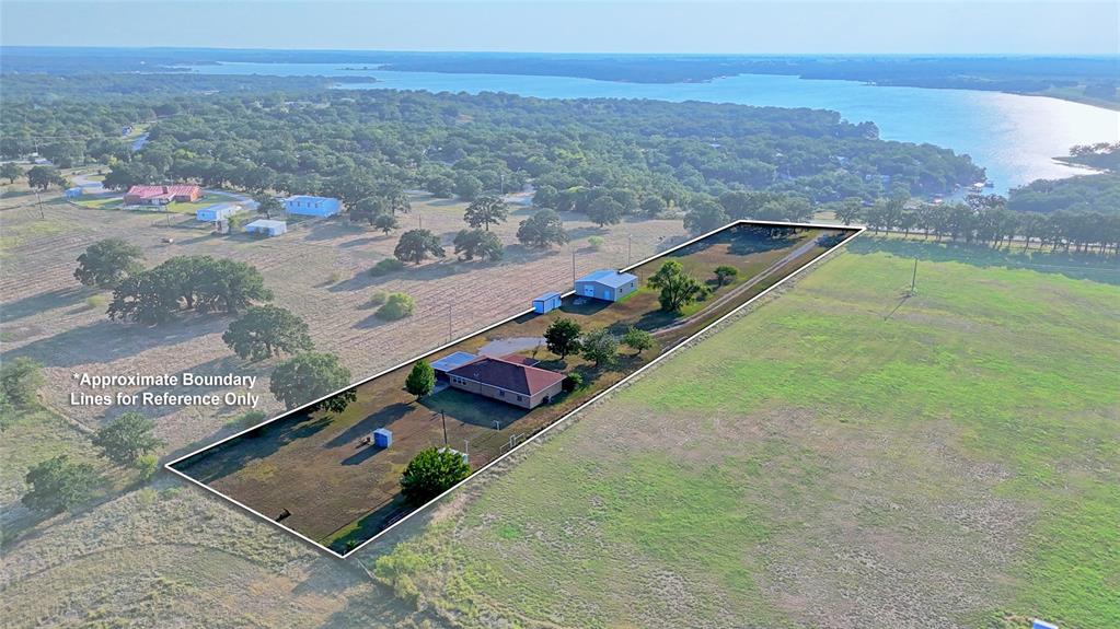 1740 Oakshores Road Nocona, TX 76255 - Photo 38 of 38 a view of a tennis court