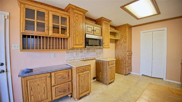 a bathroom with a sink a washer and dryer