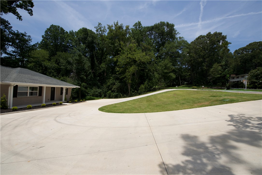 317 Pendleton Road Clemson, SC 29631 - Photo 6 of 36 A spacious concrete driveway provides ample parking and leads to this charming home.