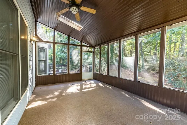 a view of house with outdoor space and a street