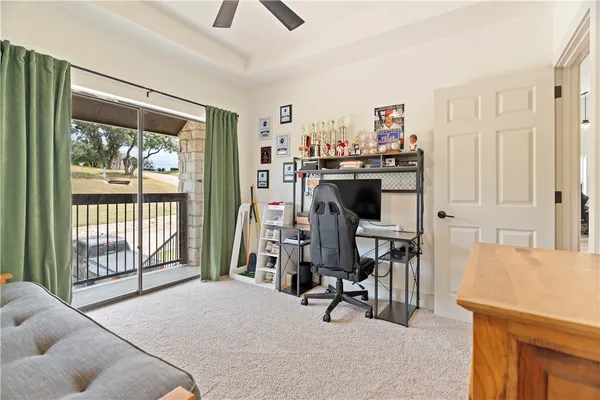 a work room with furniture and a window