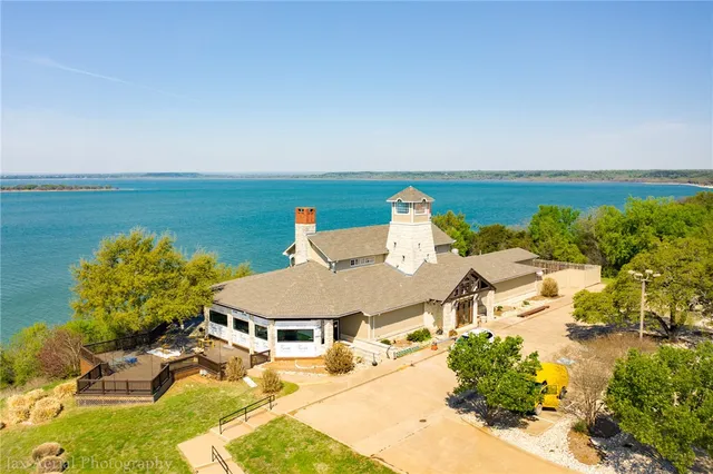 an aerial view of a house with a outdoor space