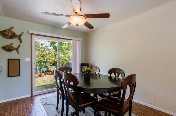 7935 Ulili Road Kekaha, HI 96752 - Photo 13 of 20 a view of a dining room with furniture window and outside view