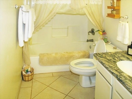 7935 Ulili Road Kekaha, HI 96752 - Photo 14 of 20 a bathroom with a sink and a mirror