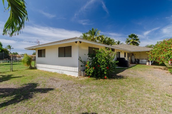 7935 Ulili Road Kekaha, HI 96752 - Photo 20 of 20 a view of a house with a yard