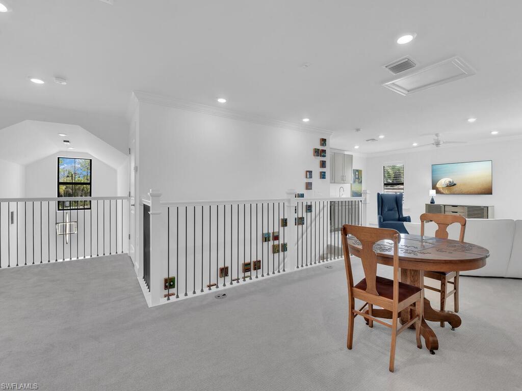 7229 Wiregrass Court Naples, FL 34114 - Photo 30 of 40 a view of a dining room with furniture