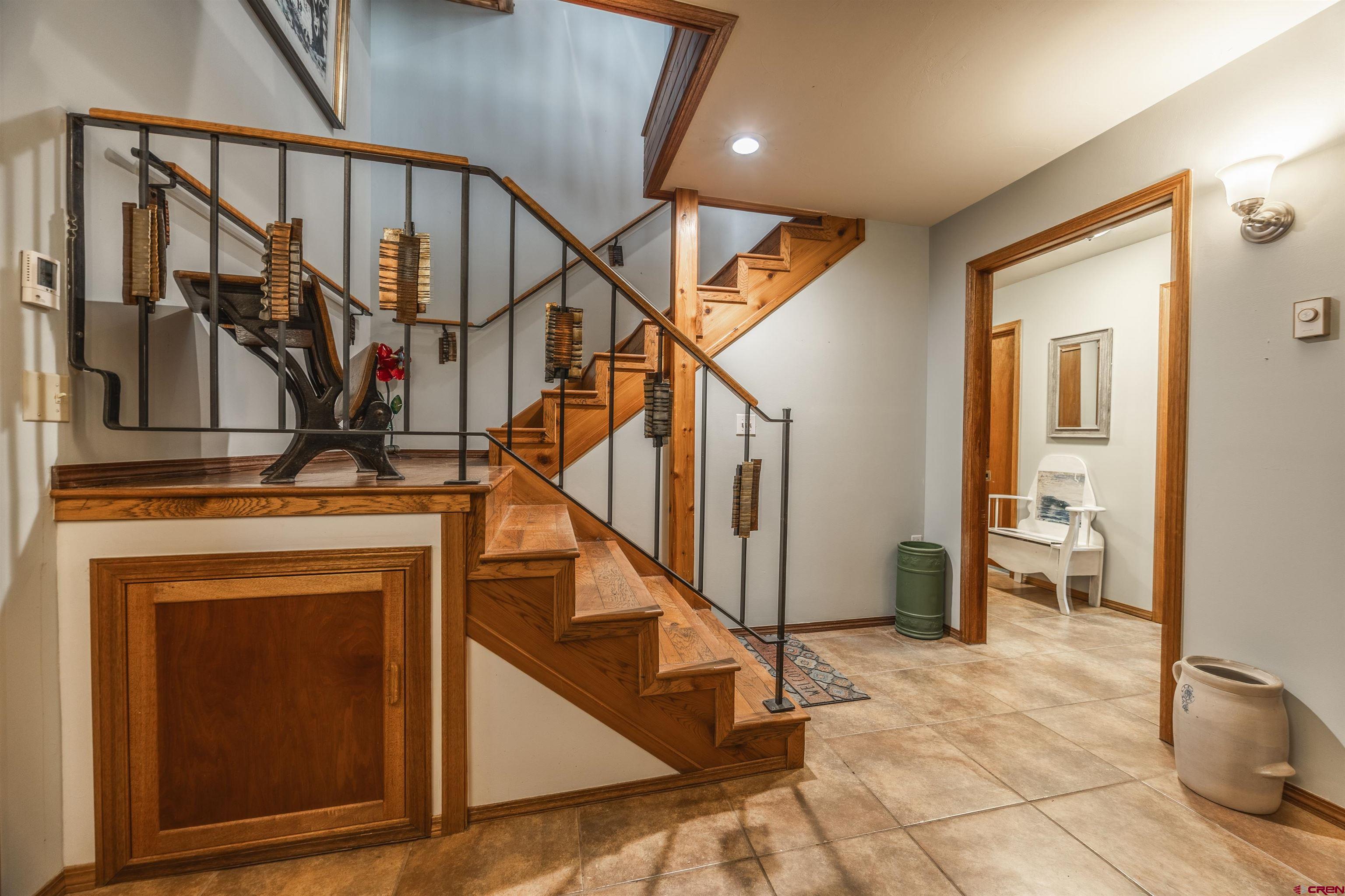 21186 Uintah Road Cedaredge, CO 81413 - Photo 6 of 45 a view of entryway and hall with wooden floor