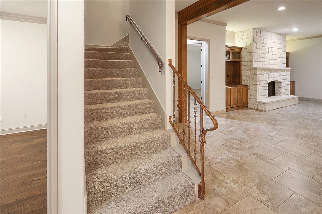 4662 Hidden Springs Way College Station, TX 77845 - Photo 32 of 48 a view of staircase with white walls and a window