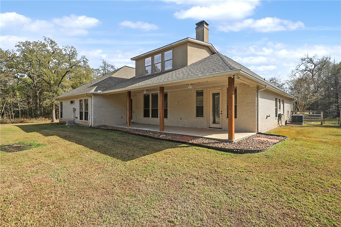 4662 Hidden Springs Way College Station, TX 77845 - Photo 40 of 48 a front view of a house with a yard
