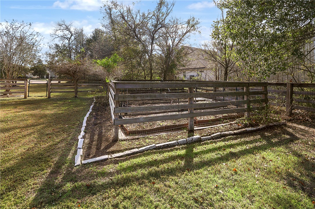 4662 Hidden Springs Way College Station, TX 77845 - Photo 43 of 48 a view of a yard with wooden fence