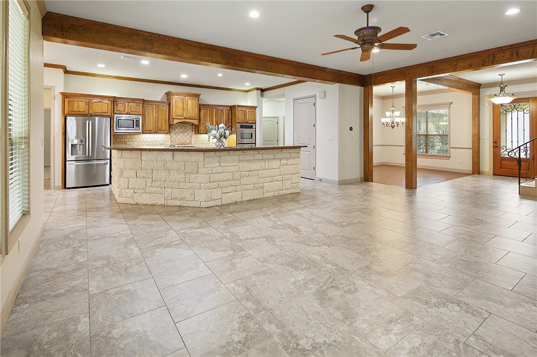 4662 Hidden Springs Way College Station, TX 77845 - Photo 9 of 48 a view interior of a house and chandelier