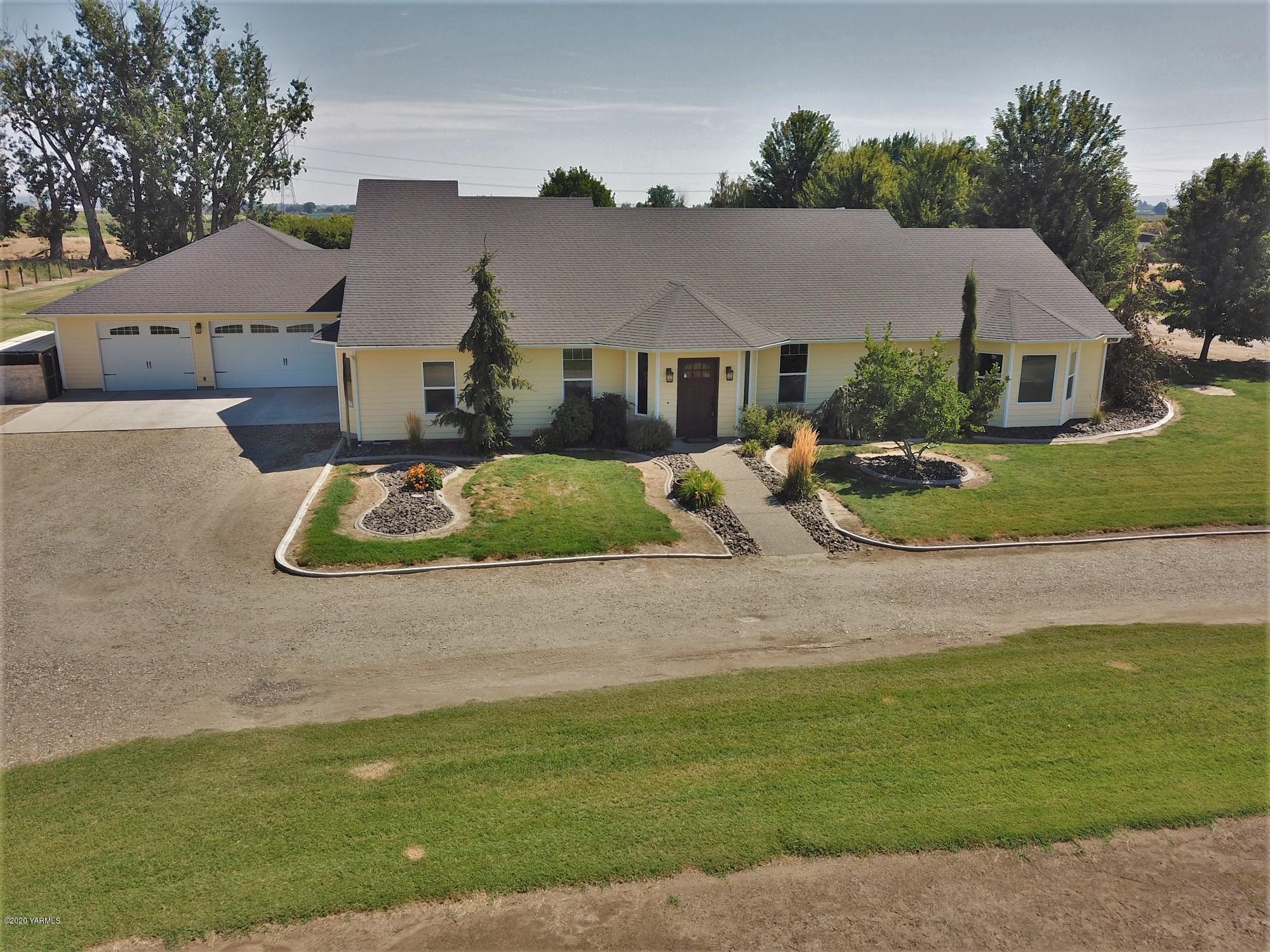 3365 Waneta Road Grandview, WA 98930 - Photo 1 of 35 a aerial view of a house with garden