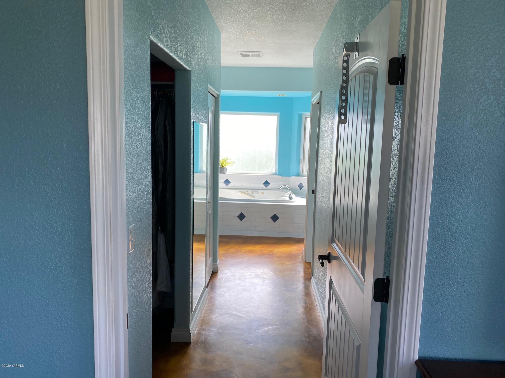 3365 Waneta Road Grandview, WA 98930 - Photo 23 of 35 a bathroom with a tub and a shower