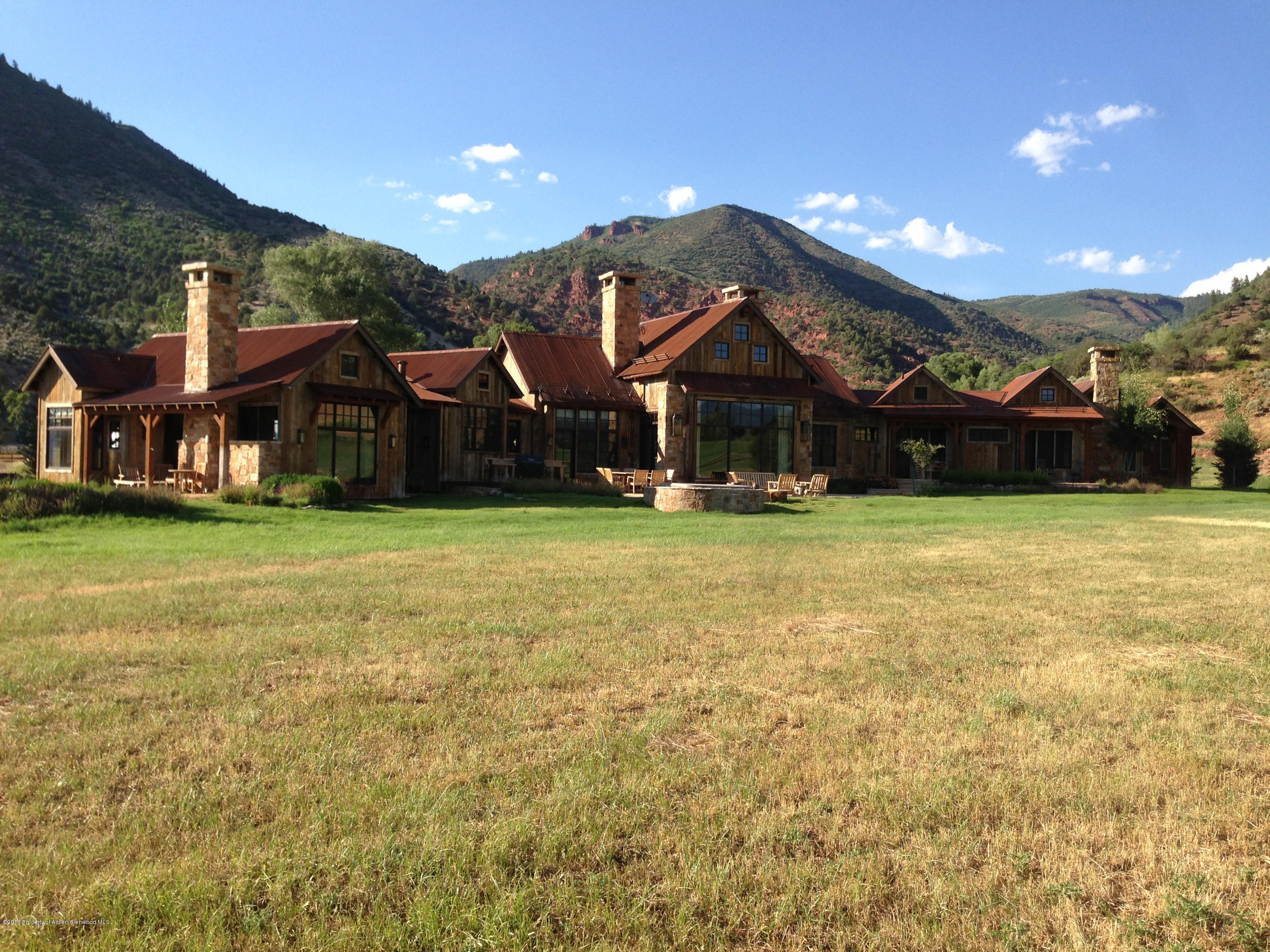 5900 Upper River Road Woody Creek, CO 81656 - Photo 1 of 1 a view of a house with a yard