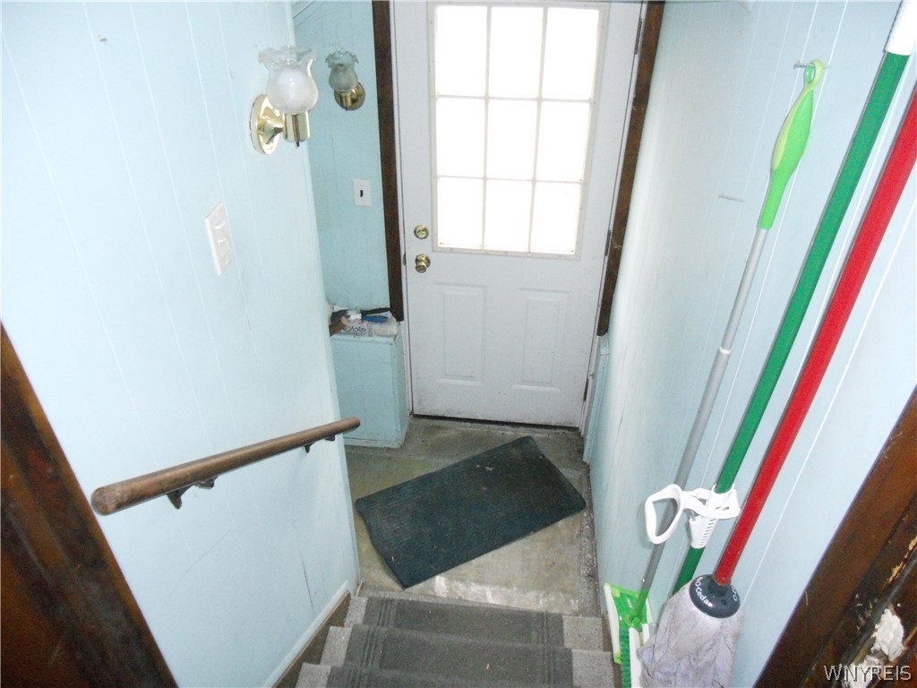 7041 Maple Road Alabama, NY 14013 - Photo 30 of 50 exit near kitchen to basement and driveway