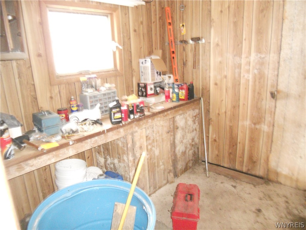 7041 Maple Road Alabama, NY 14013 - Photo 43 of 50 Garage Work bench in shop area