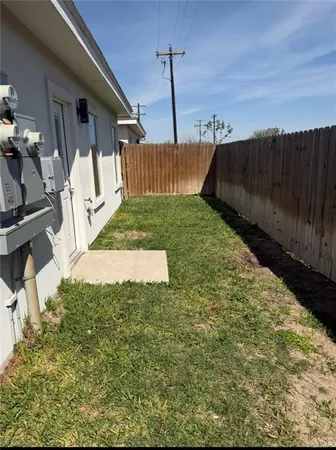 a view of backyard with green space
