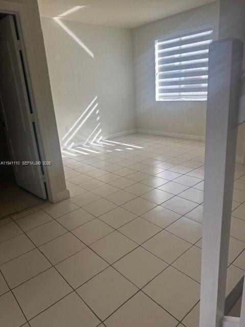 7325 Northwest 174th Terrace, Unit 104 Hialeah, FL 33015 - Photo 2 of 10 a view of room and window