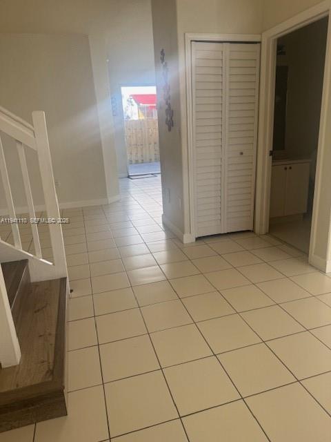 7325 Northwest 174th Terrace, Unit 104 Hialeah, FL 33015 - Photo 4 of 10 a view of a livingroom with an empty space and a sink