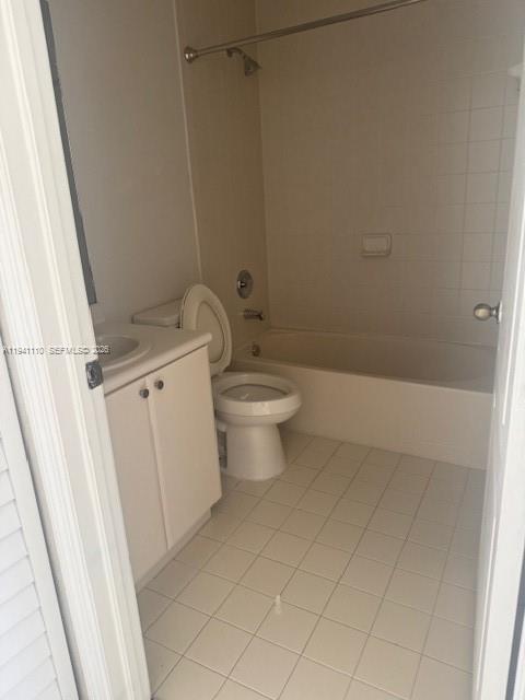 7325 Northwest 174th Terrace, Unit 104 Hialeah, FL 33015 - Photo 5 of 10 a bathroom with a sink a toilet and shower