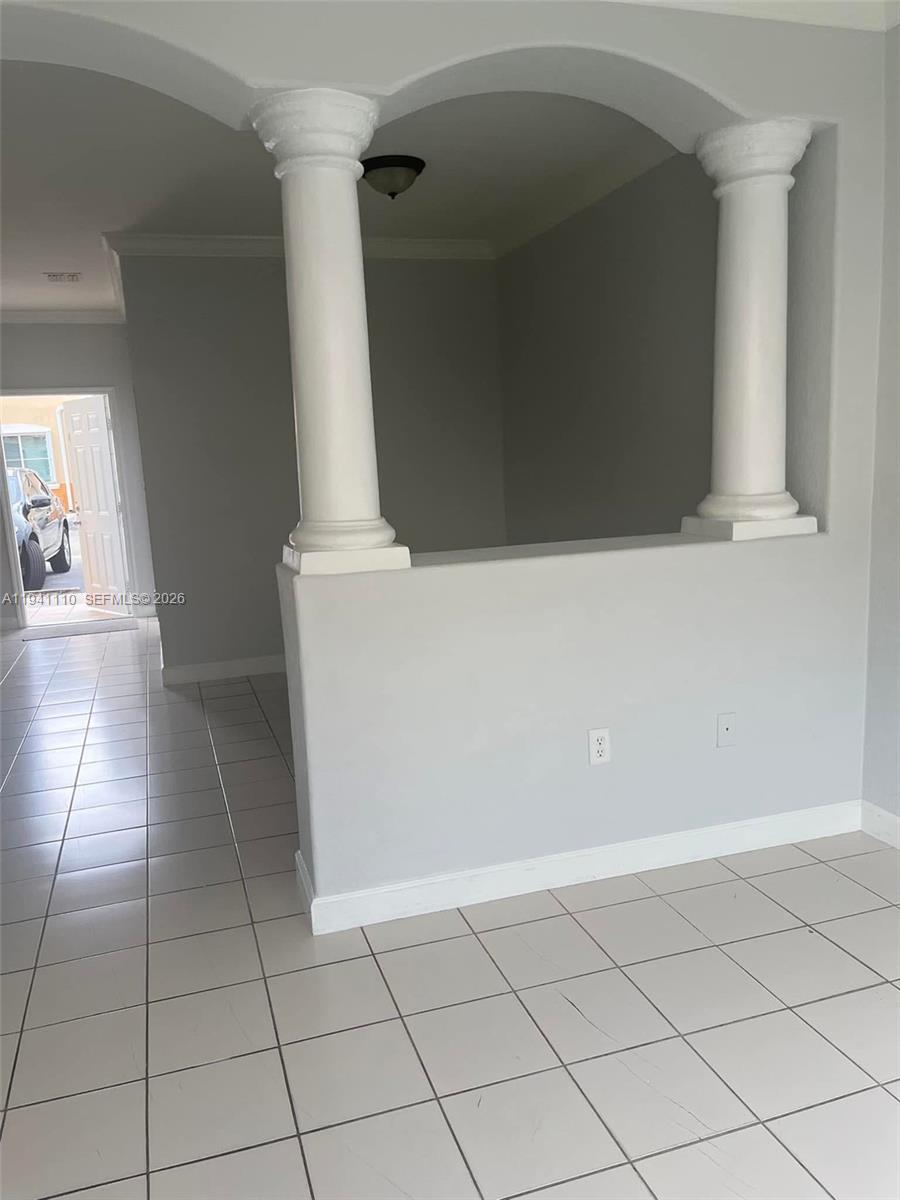 7325 Northwest 174th Terrace, Unit 104 Hialeah, FL 33015 - Photo 6 of 10 a view of a utility room