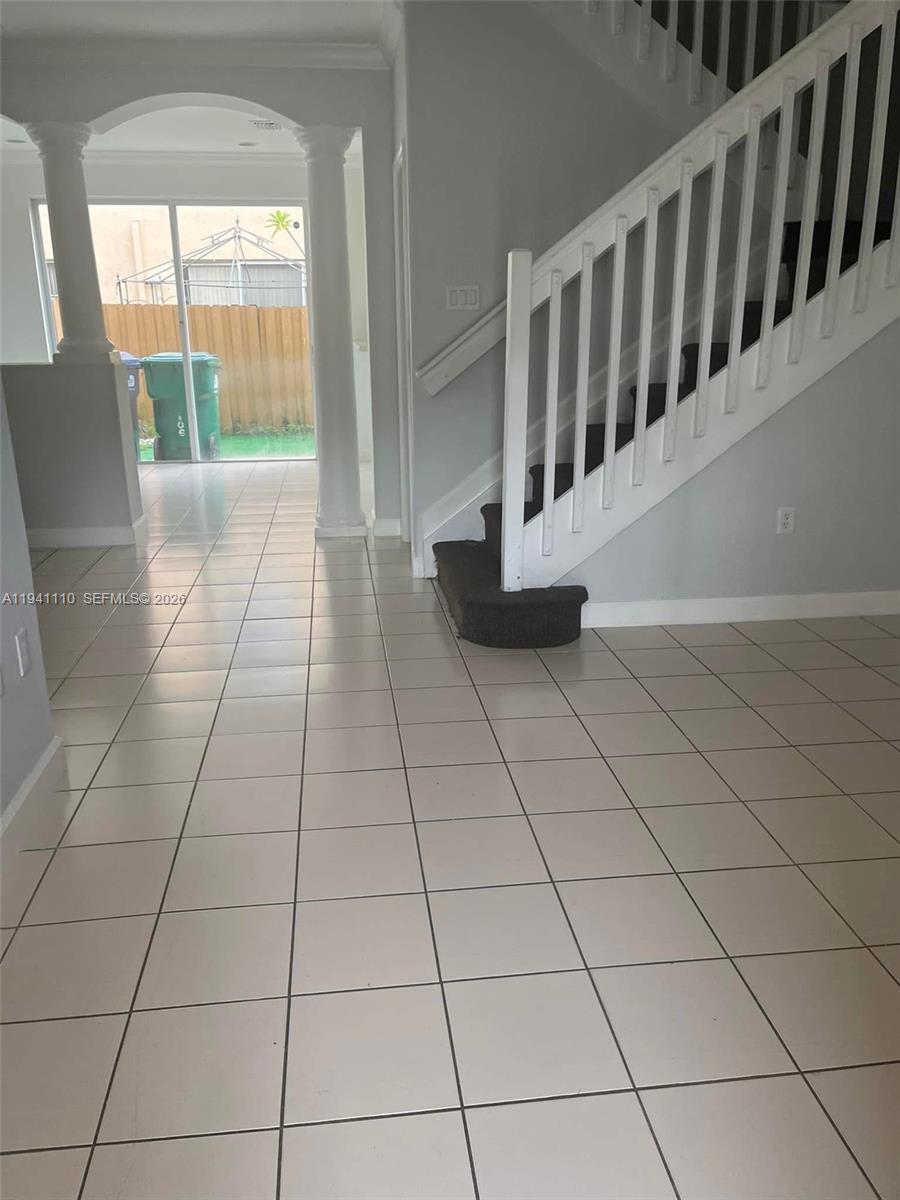 7325 Northwest 174th Terrace, Unit 104 Hialeah, FL 33015 - Photo 7 of 10 a view of wooden floor