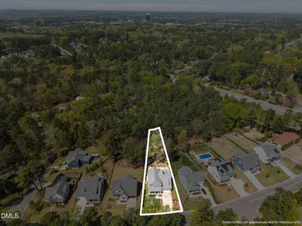 an aerial view of residential house with parking space