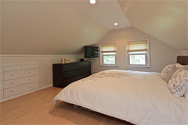66 Munroe Road Lexington, MA 02421 - Photo 13 of 15 a bedroom with a bed and a window