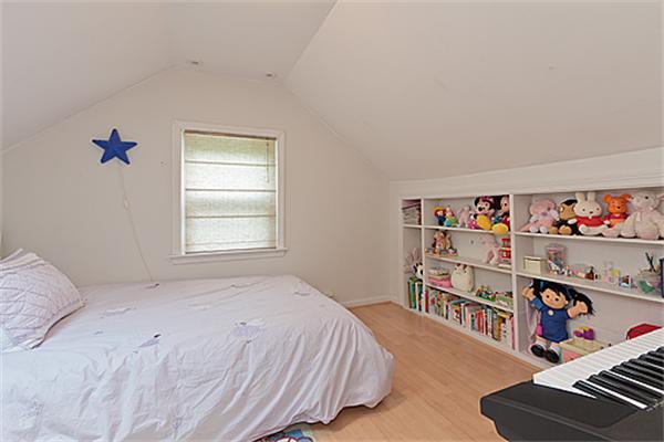 66 Munroe Road Lexington, MA 02421 - Photo 14 of 15 a bedroom with a bed and closet