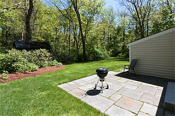 66 Munroe Road Lexington, MA 02421 - Photo 10 of 15 a view of a backyard with sitting area
