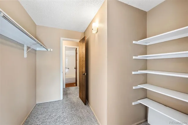 a bathroom with a sink double vanity granite tub and shower