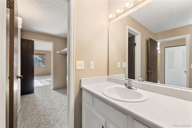 a bathroom with a tub and a shower