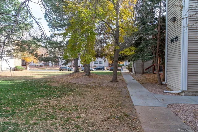 front view of a building with a yard
