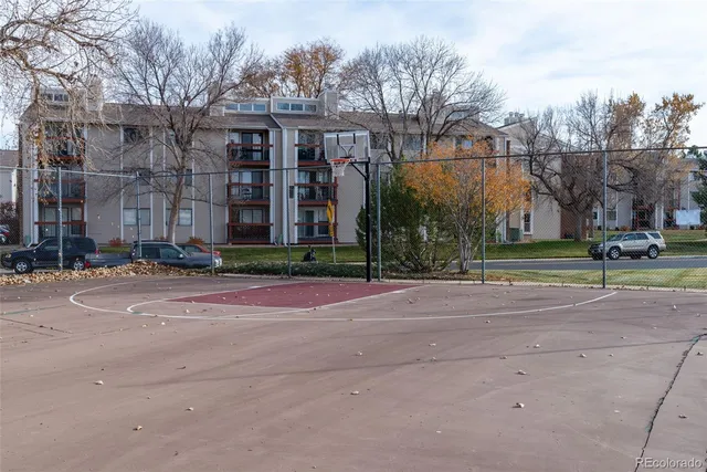 a backyard of a house with barbeque oven